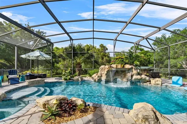 a view of a garden with an ocean