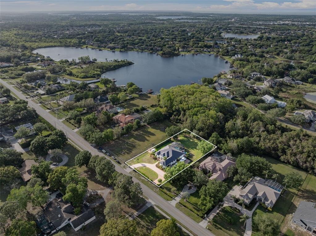13137 Lake Butler Boulevard Windermere, FL 34786 - Photo 82 of 98 an aerial view of residential house with outdoor space