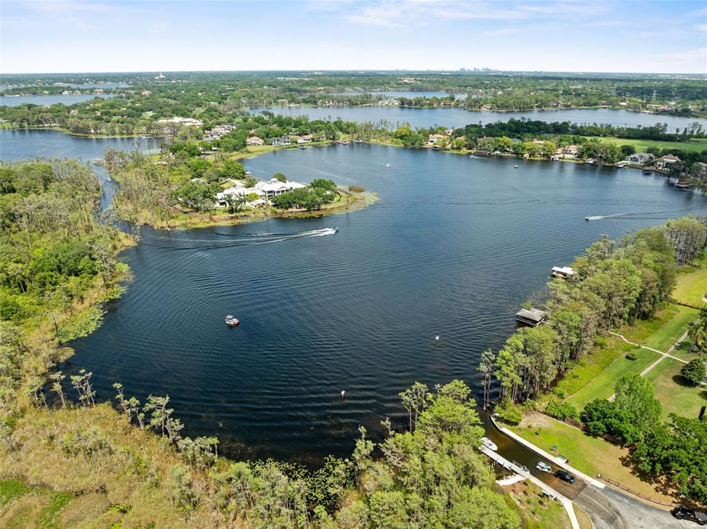 13137 Lake Butler Boulevard Windermere, FL 34786 - Photo 91 of 98 a view of a lake with a city