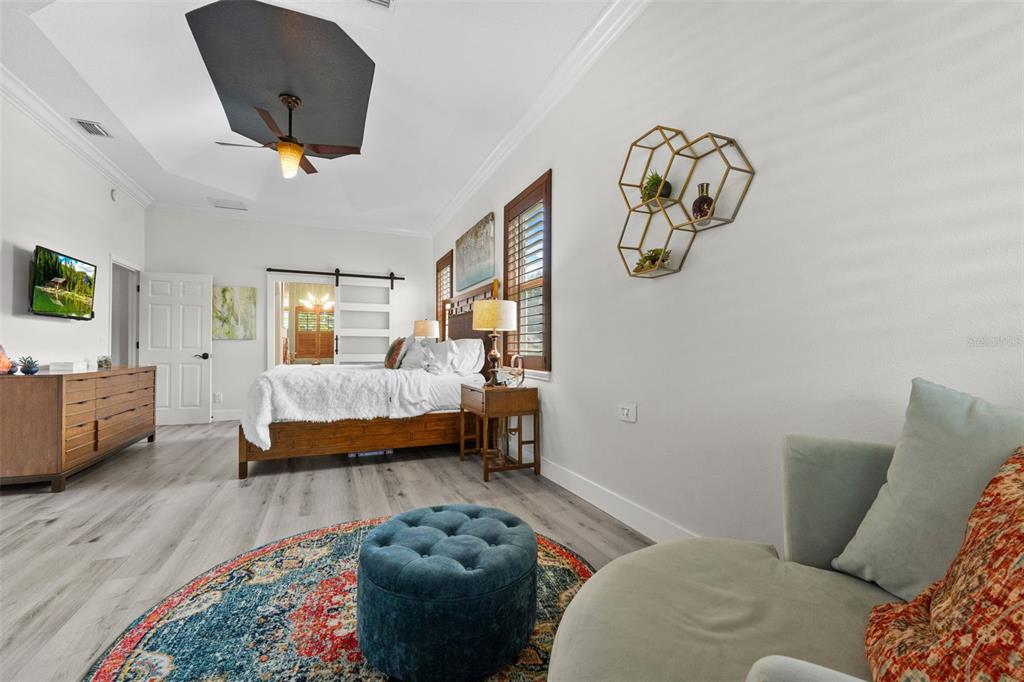 13137 Lake Butler Boulevard Windermere, FL 34786 - Photo 10 of 98 a bedroom with furniture and a window