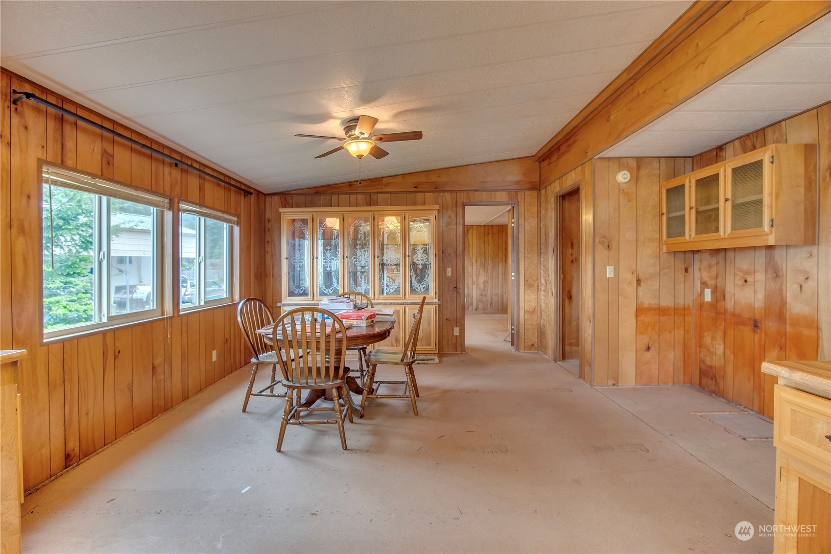 140 Maple Place Packwood, WA 98361 - Photo 17 of 39 a dining room with furniture and window