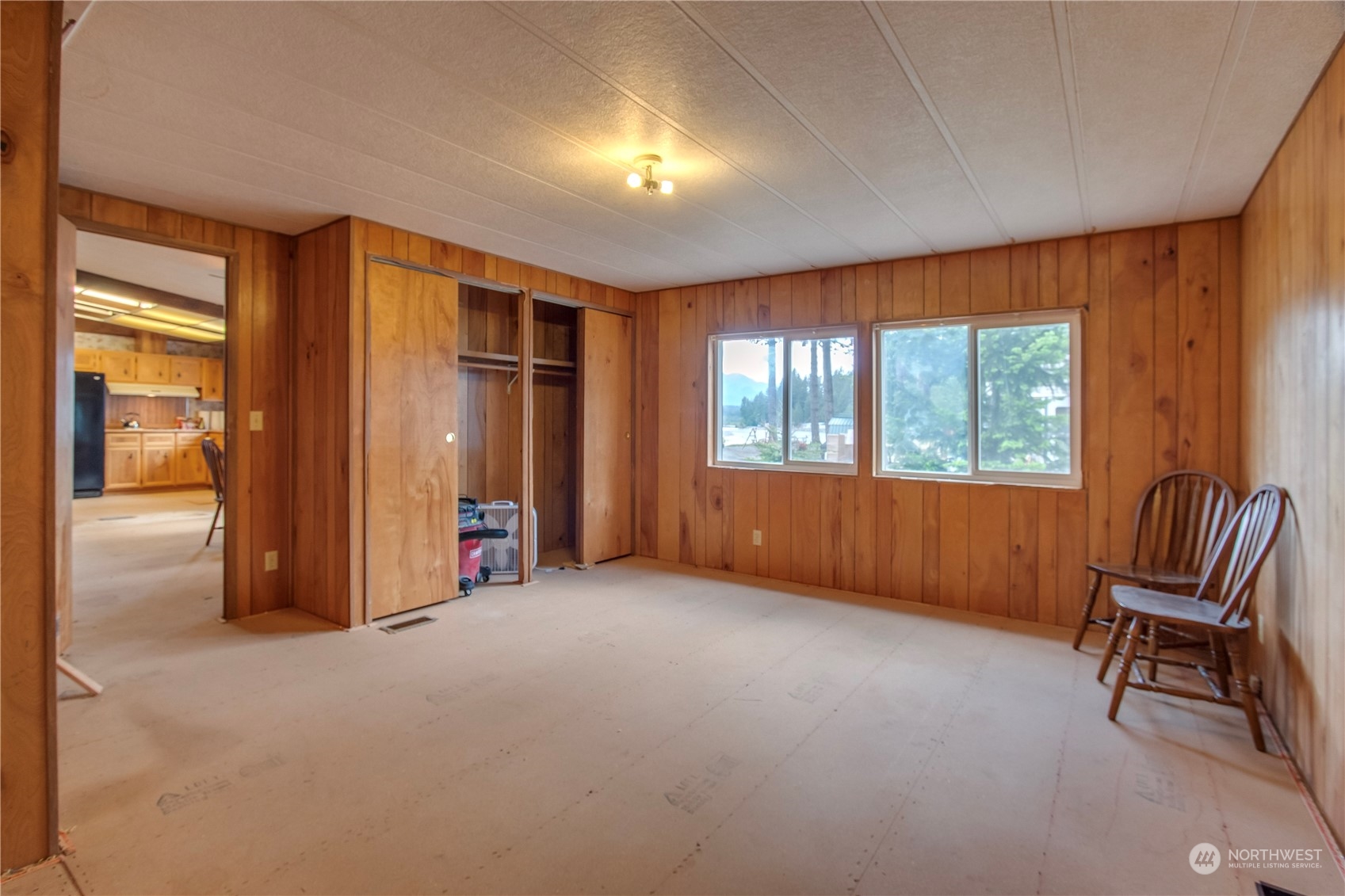 140 Maple Place Packwood, WA 98361 - Photo 29 of 39 a view of a livingroom with furniture and windows