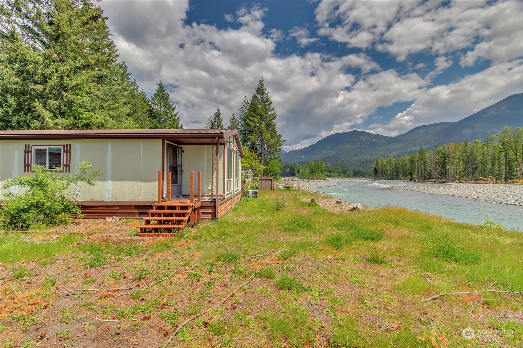 140 Maple Place Packwood, WA 98361 - Photo 7 of 39 a view of backyard with swimming pool and outdoor seating