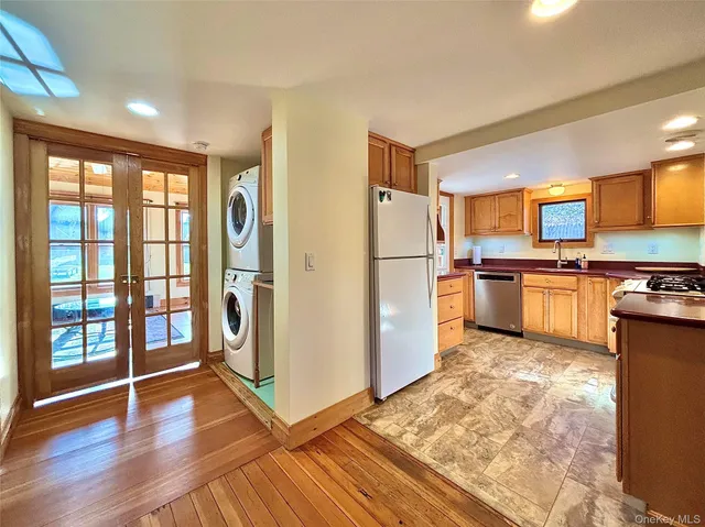 a view of a room with washer and dryer