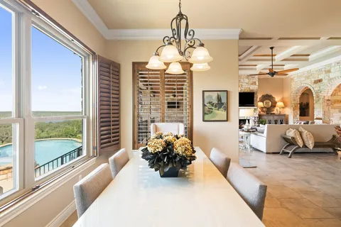 a lobby with furniture and a large window