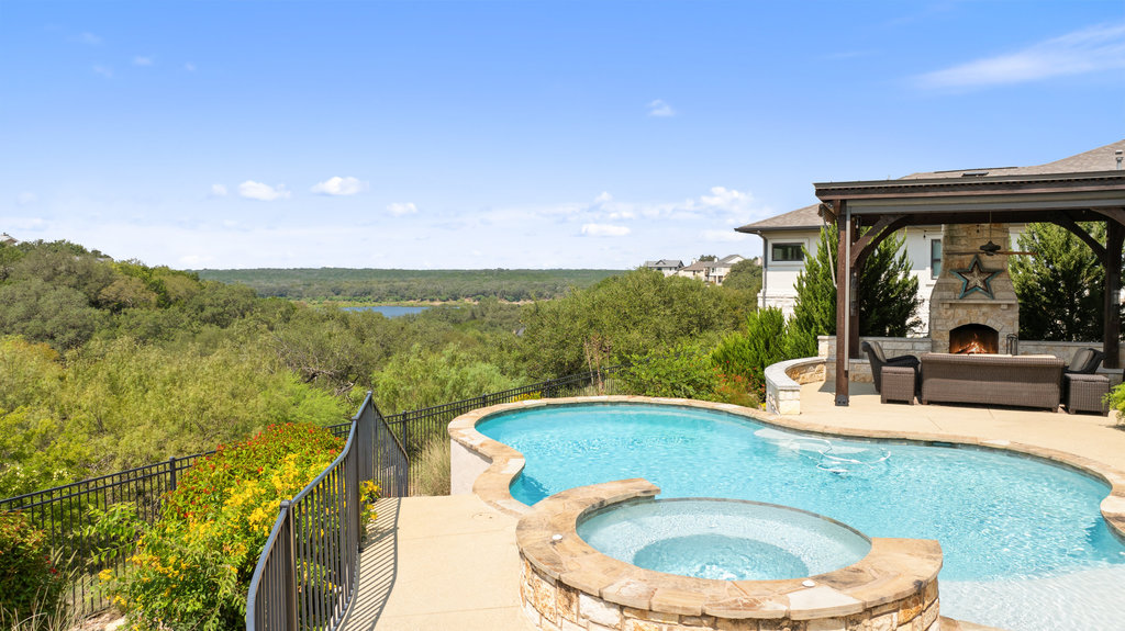 839 Wesley Ridge Drive Spicewood, TX 78669 - Photo 37 of 40 a bathroom with a sink and mirror