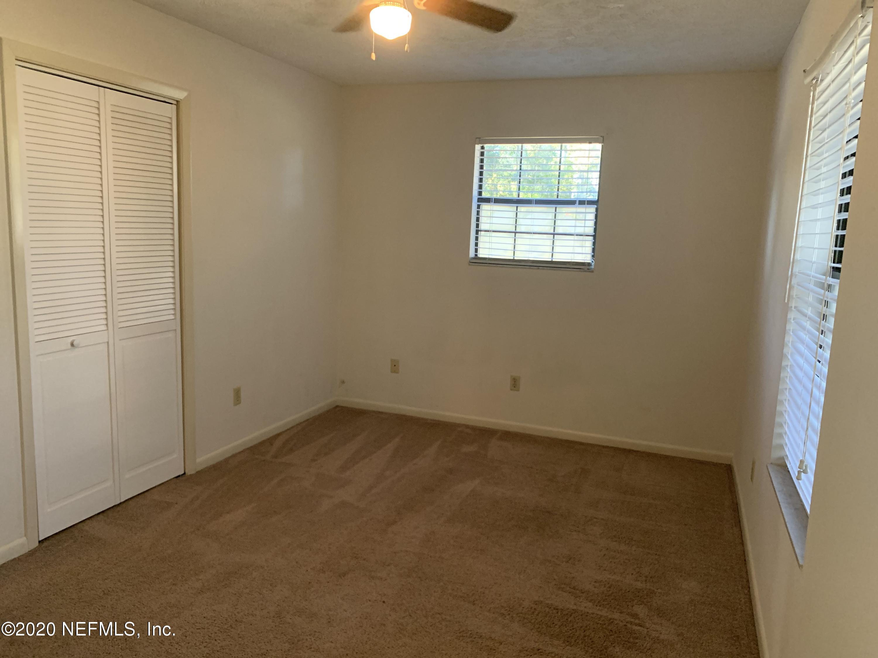 420 Southwest Naha Street Keystone Heights, FL 32656 - Photo 19 of 29 an empty room with windows