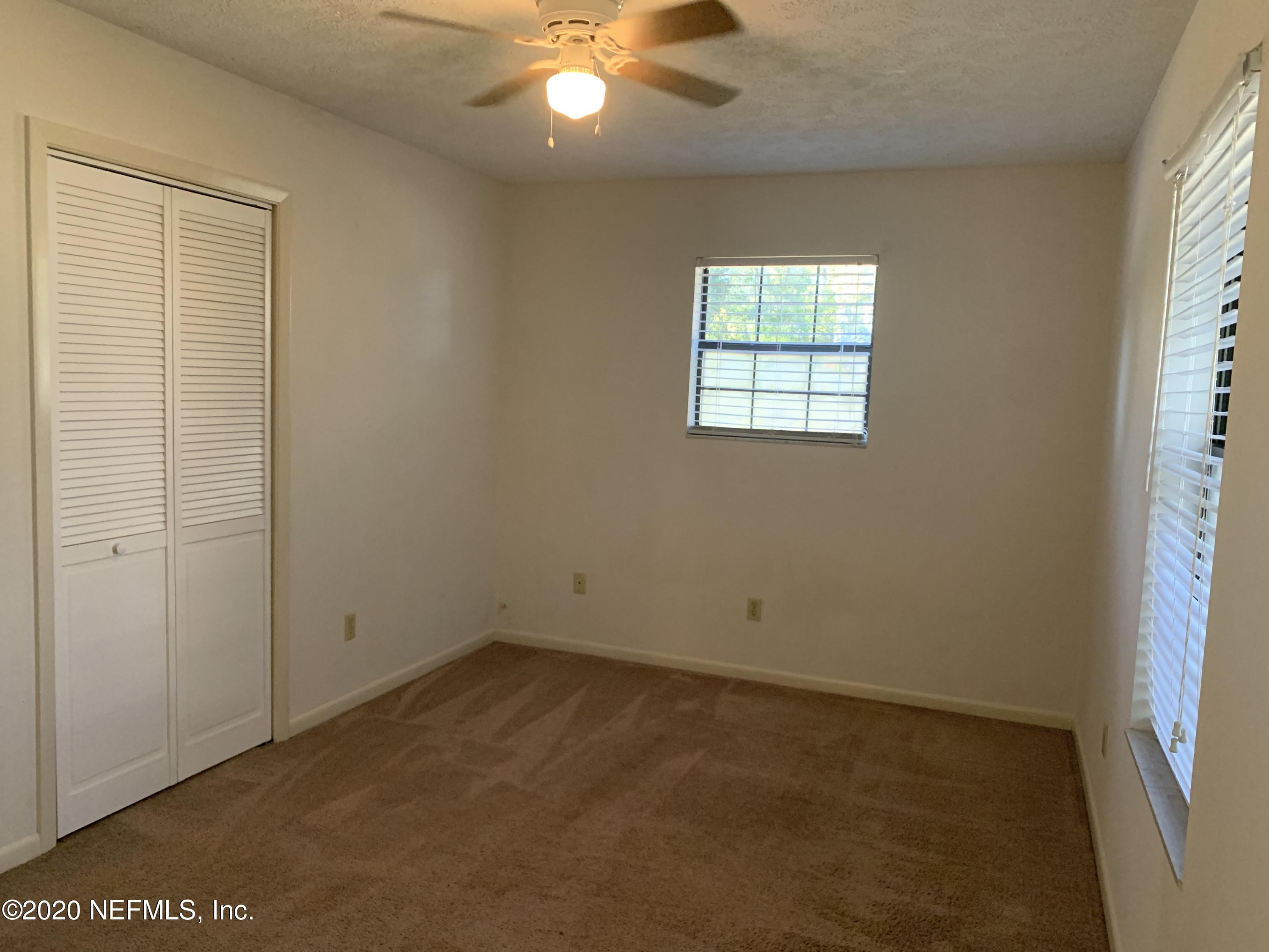420 Southwest Naha Street Keystone Heights, FL 32656 - Photo 20 of 29 an empty room with a window