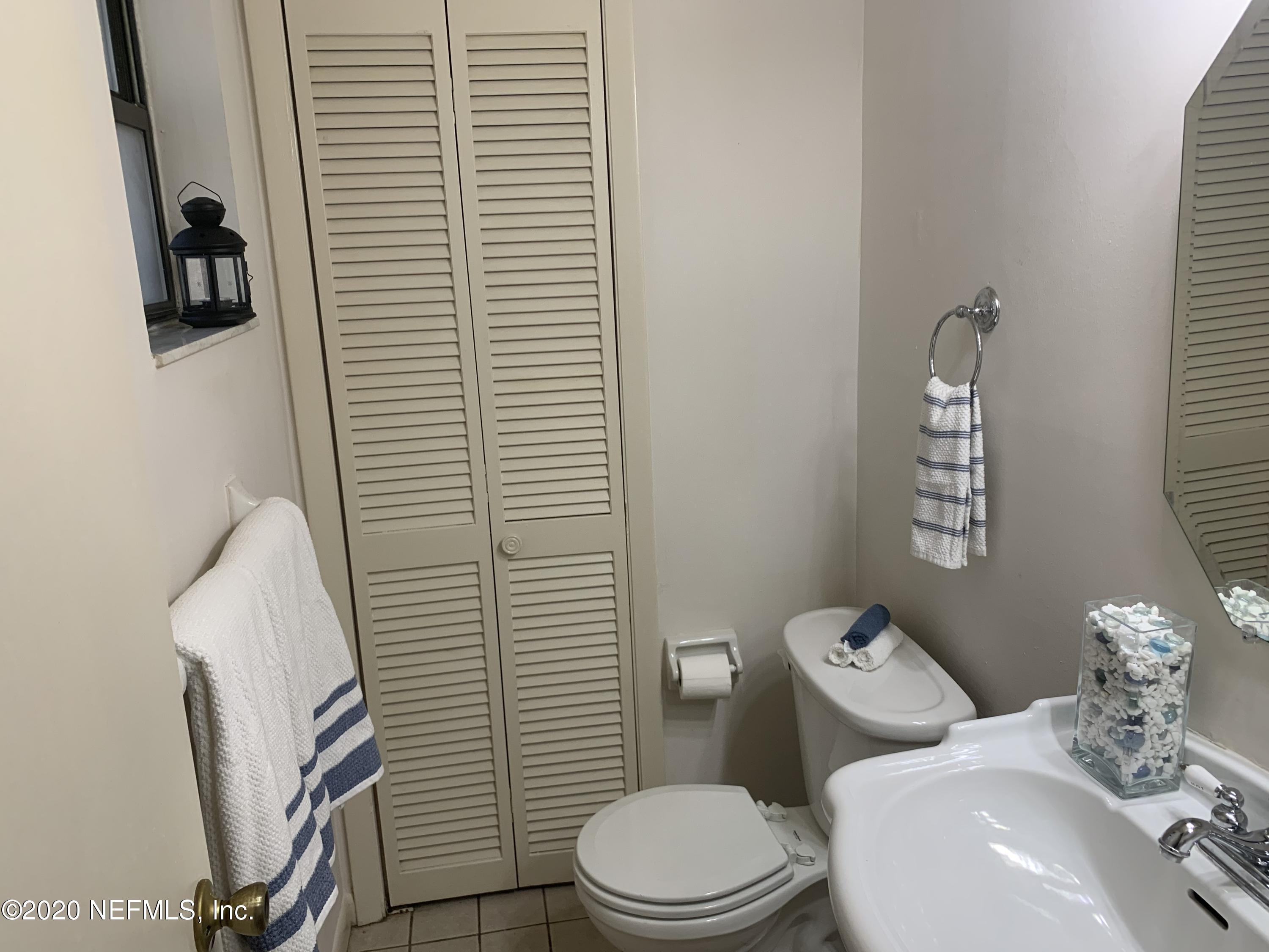 420 Southwest Naha Street Keystone Heights, FL 32656 - Photo 22 of 29 a white toilet sitting next to a bathroom sink
