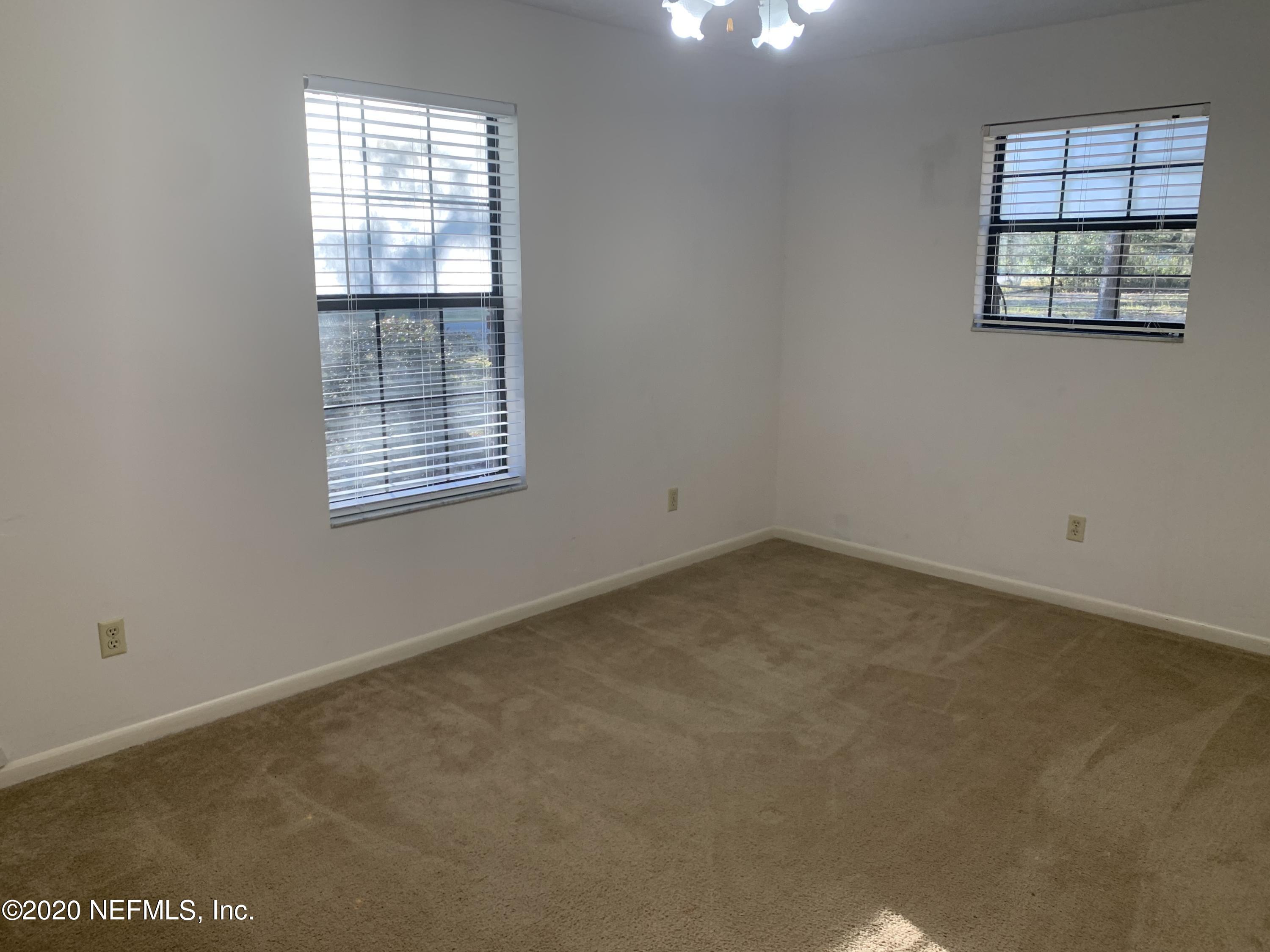 420 Southwest Naha Street Keystone Heights, FL 32656 - Photo 23 of 29 an empty room with windows