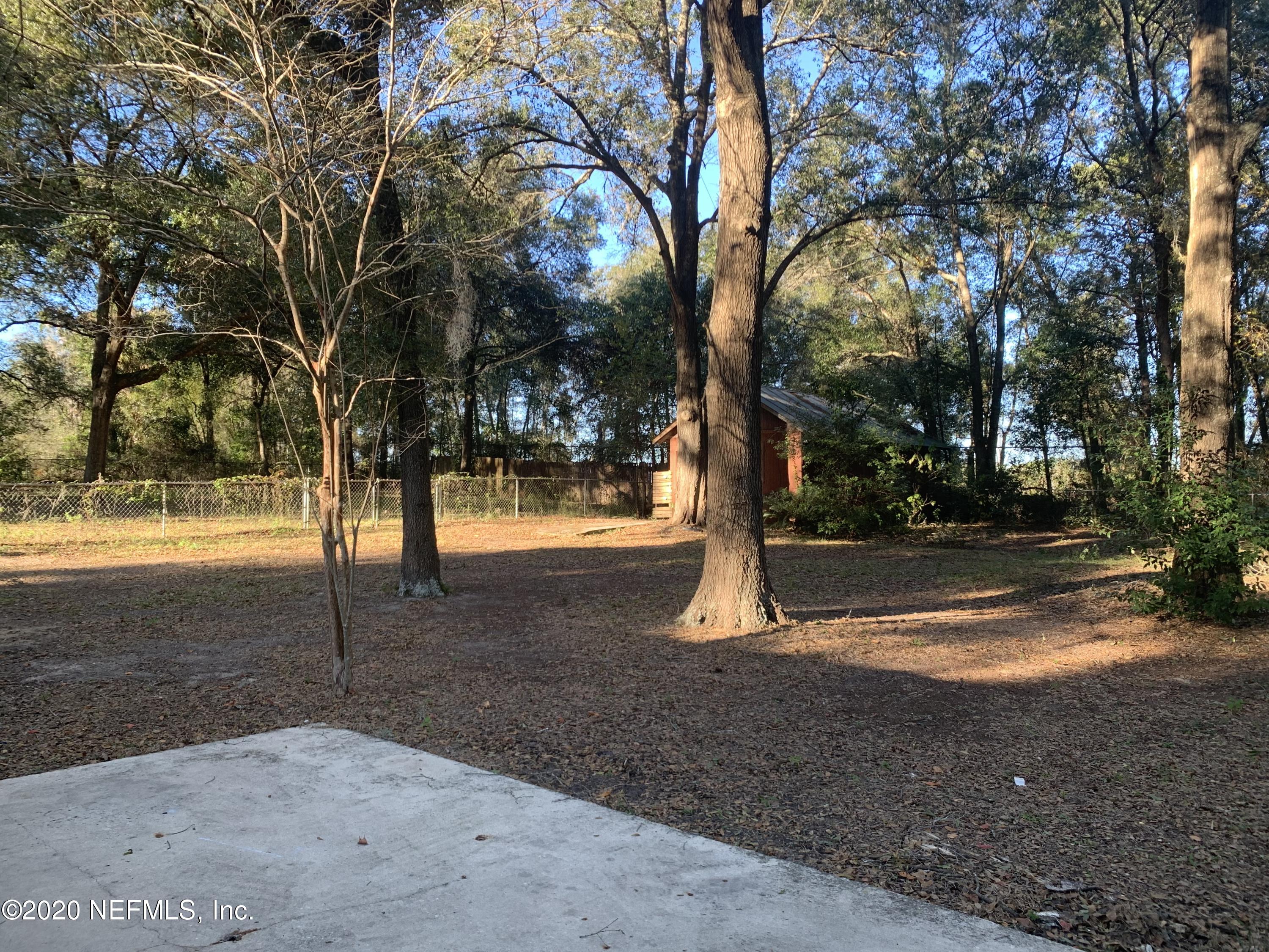 420 Southwest Naha Street Keystone Heights, FL 32656 - Photo 27 of 29 a view of outdoor space with trees