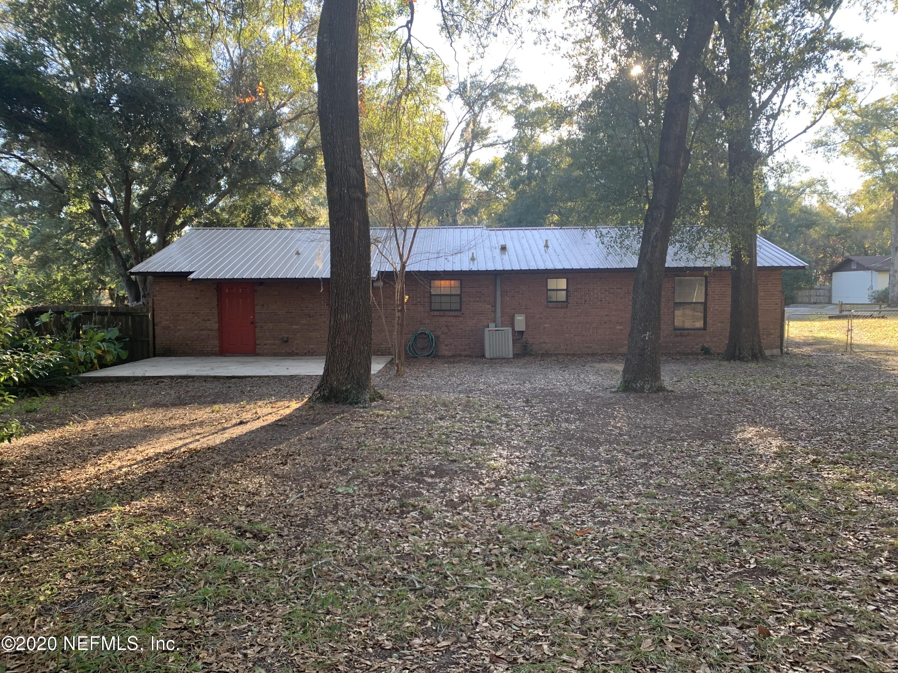 420 Southwest Naha Street Keystone Heights, FL 32656 - Photo 29 of 29 a house view with a backyard space