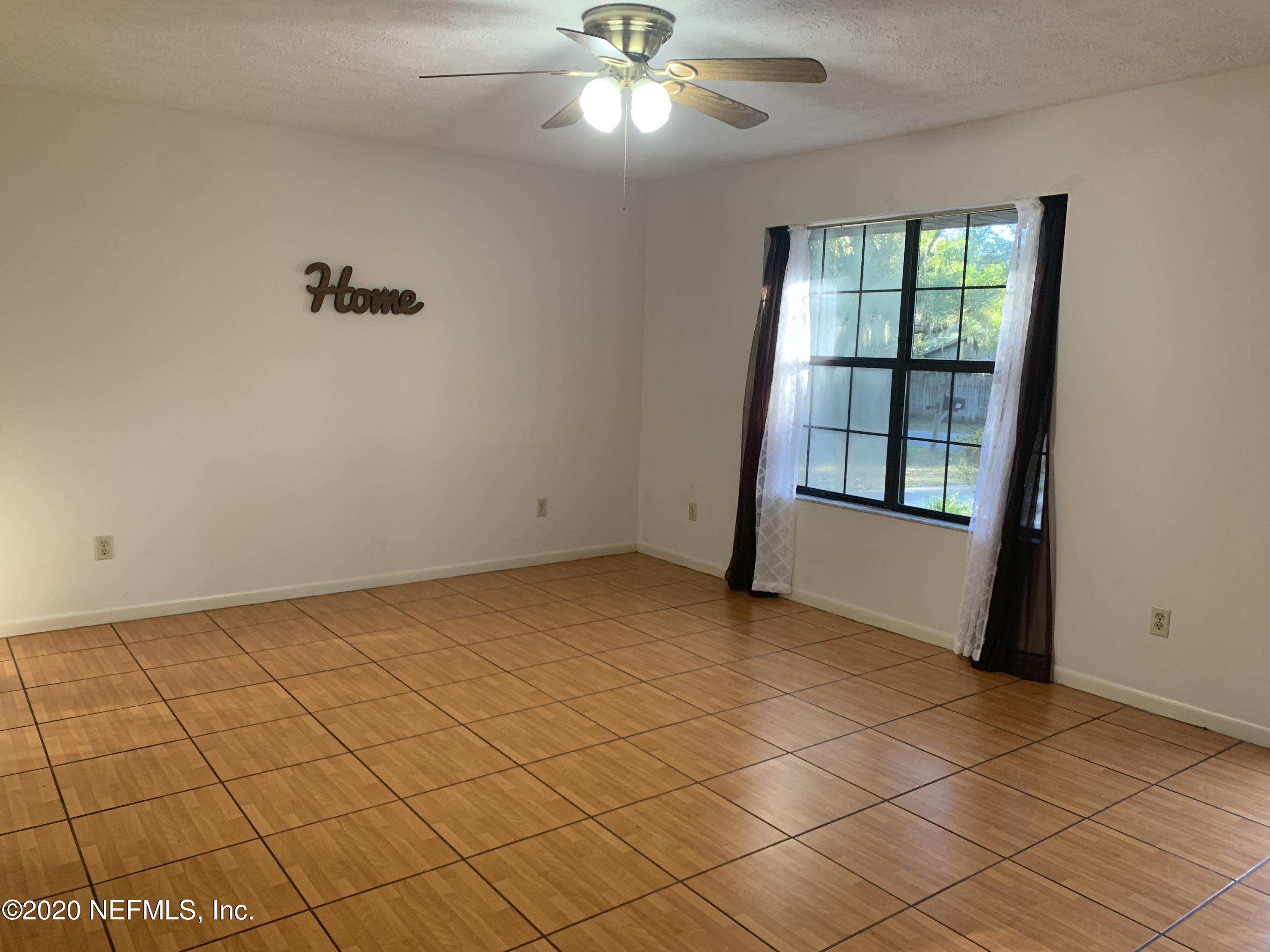420 Southwest Naha Street Keystone Heights, FL 32656 - Photo 7 of 29 a view of an empty room and window