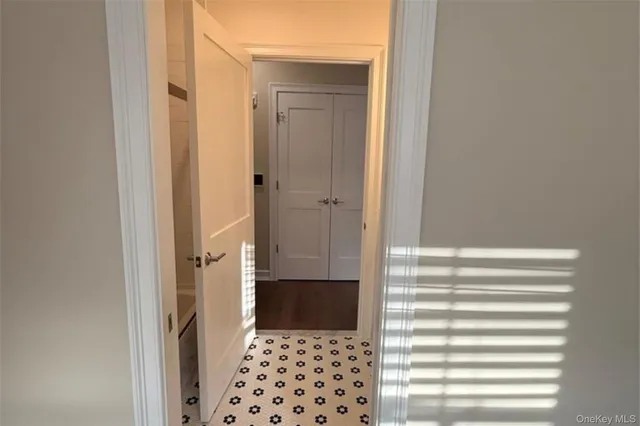 a view of a bathroom with a sink and a shower