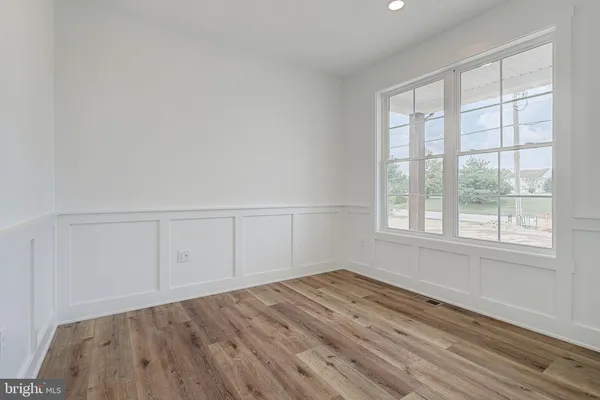 a view of entryway with stairs and a window