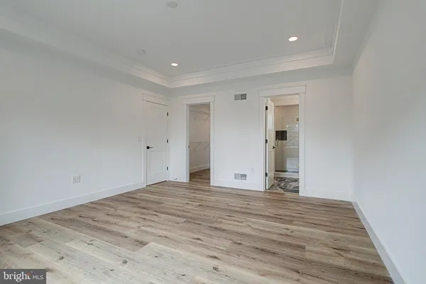 a bathroom with double vanity sink and mirror