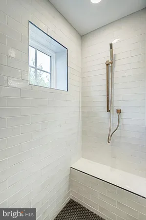 a bathroom with a sink a mirror and vanity