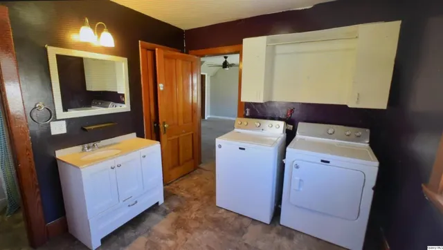 a utility room with dryer and washer