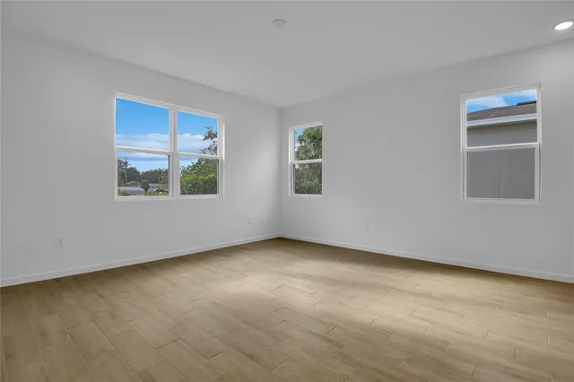 an empty room with windows