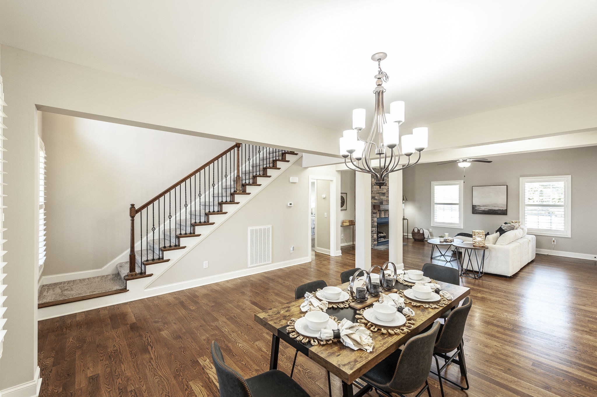 5563 Stacy Springs Road Springfield, TN 37172 - Photo 11 of 73 a view of a dining room with furniture wooden floor and chandelier