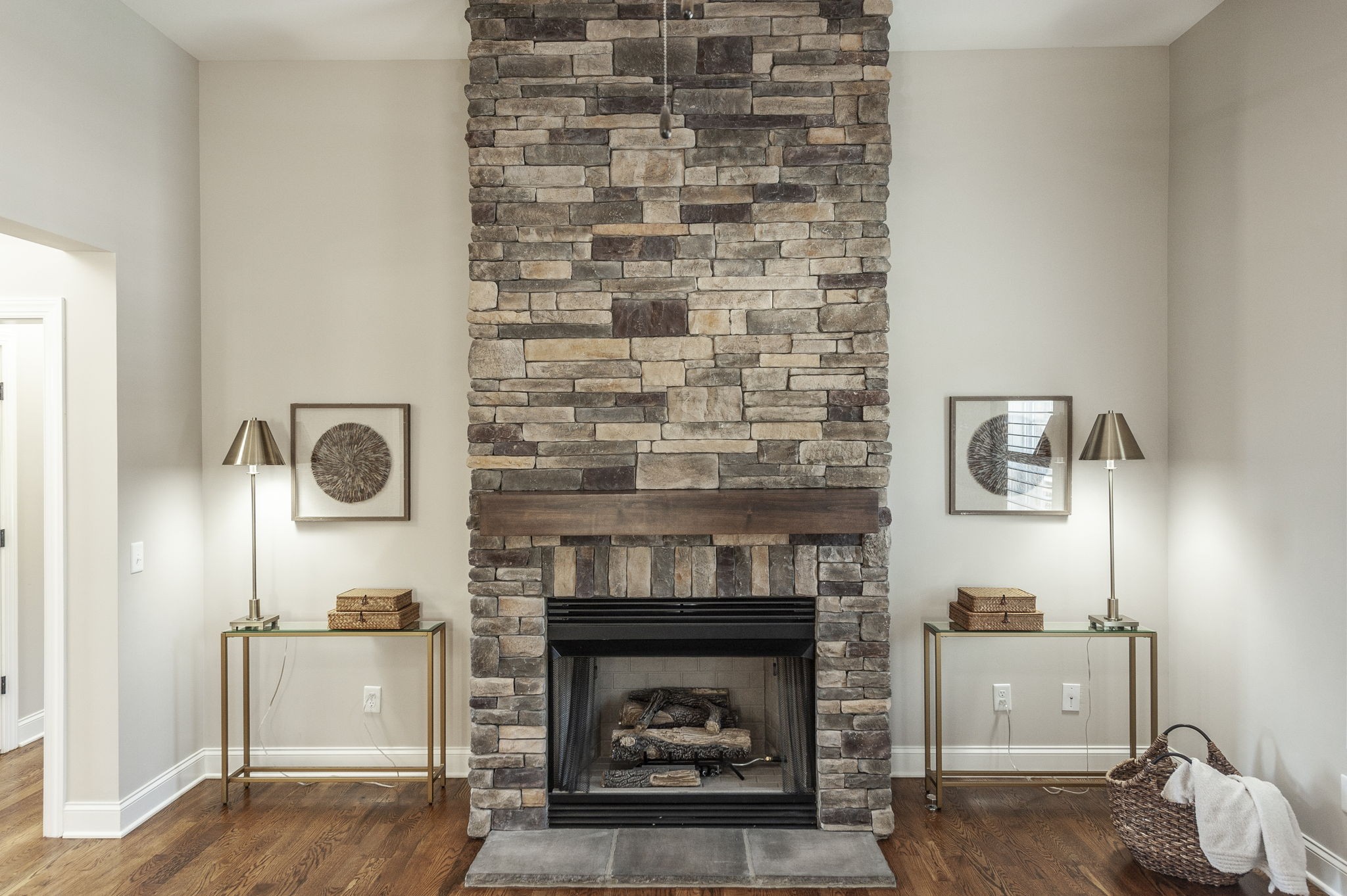 5563 Stacy Springs Road Springfield, TN 37172 - Photo 14 of 73 a living room with a fireplace and wooden floor