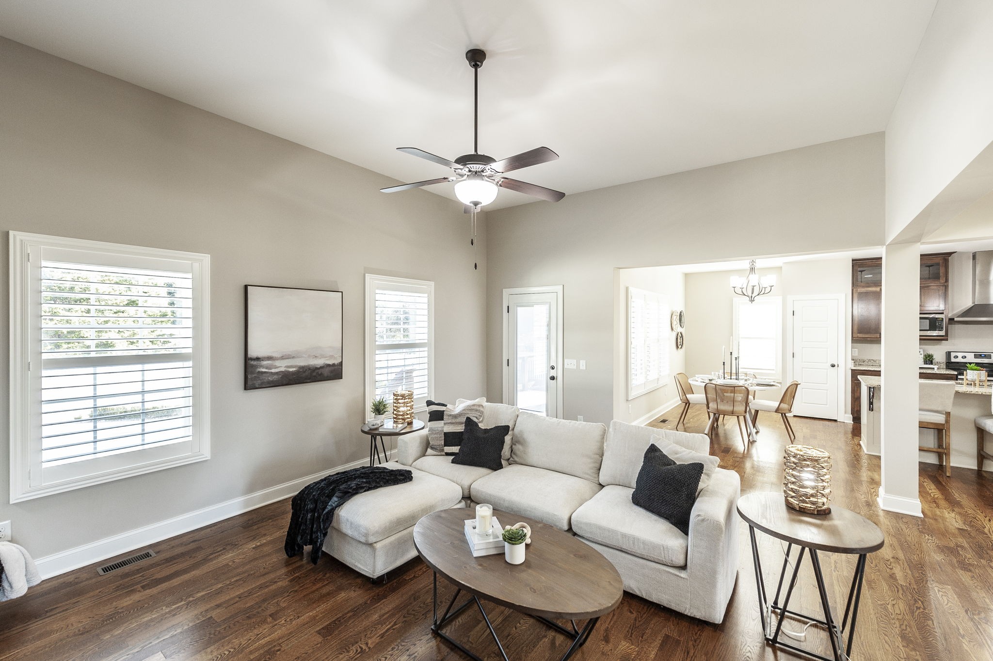 5563 Stacy Springs Road Springfield, TN 37172 - Photo 15 of 73 a living room with furniture a chandelier fan and a large window