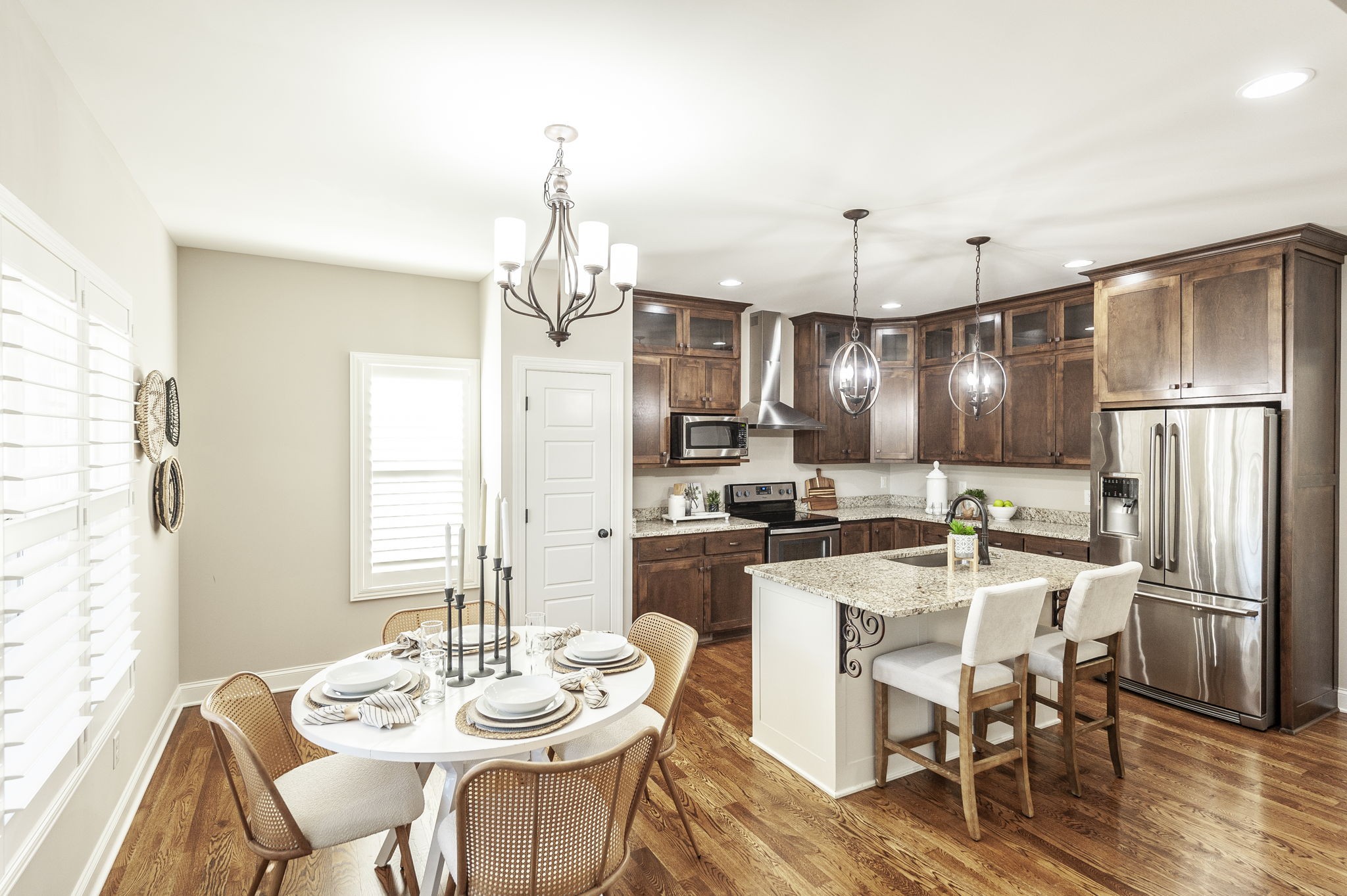 5563 Stacy Springs Road Springfield, TN 37172 - Photo 17 of 73 a view of a dining room with furniture window and wooden floor