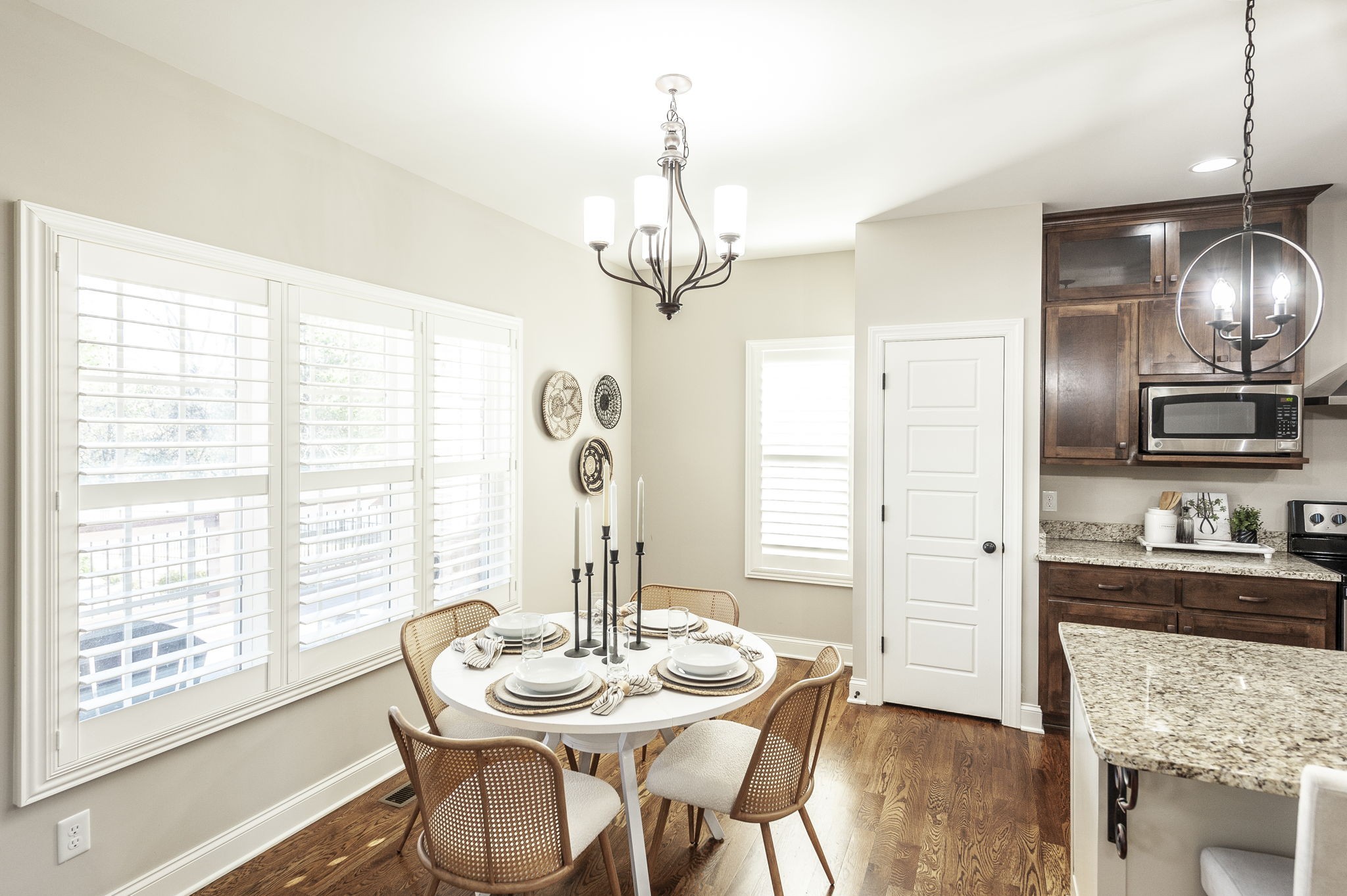 5563 Stacy Springs Road Springfield, TN 37172 - Photo 18 of 73 a view of a dining room with furniture large window and wooden floor