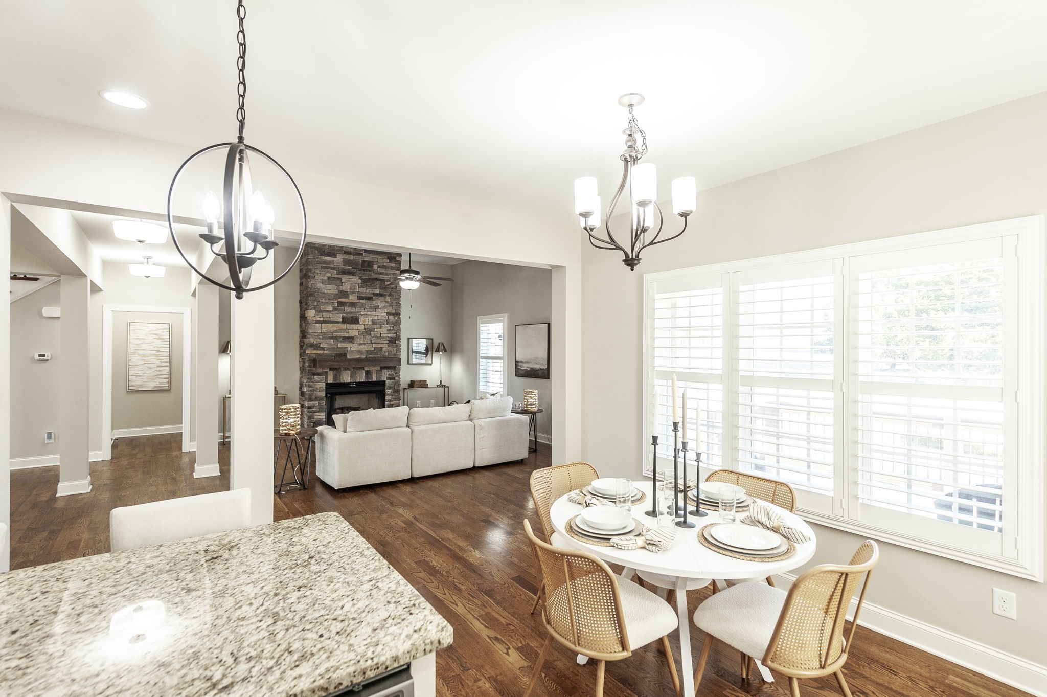5563 Stacy Springs Road Springfield, TN 37172 - Photo 19 of 73 a view of a dining room with furniture wooden floor and chandelier