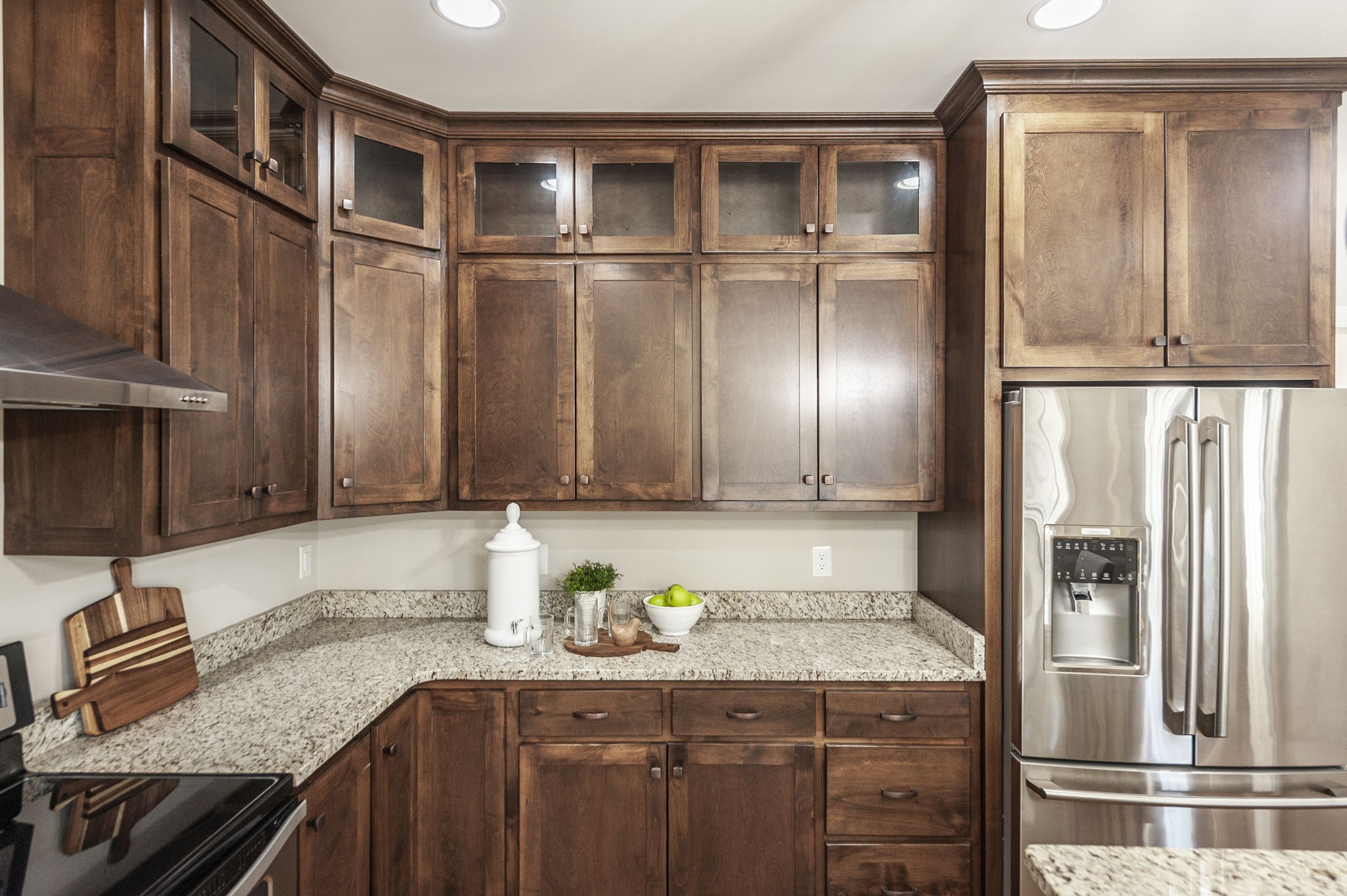 5563 Stacy Springs Road Springfield, TN 37172 - Photo 24 of 73 a kitchen with granite countertop a refrigerator and wooden cabinets