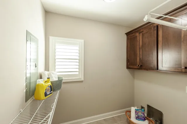 a bathroom with a double vanity sink and mirror