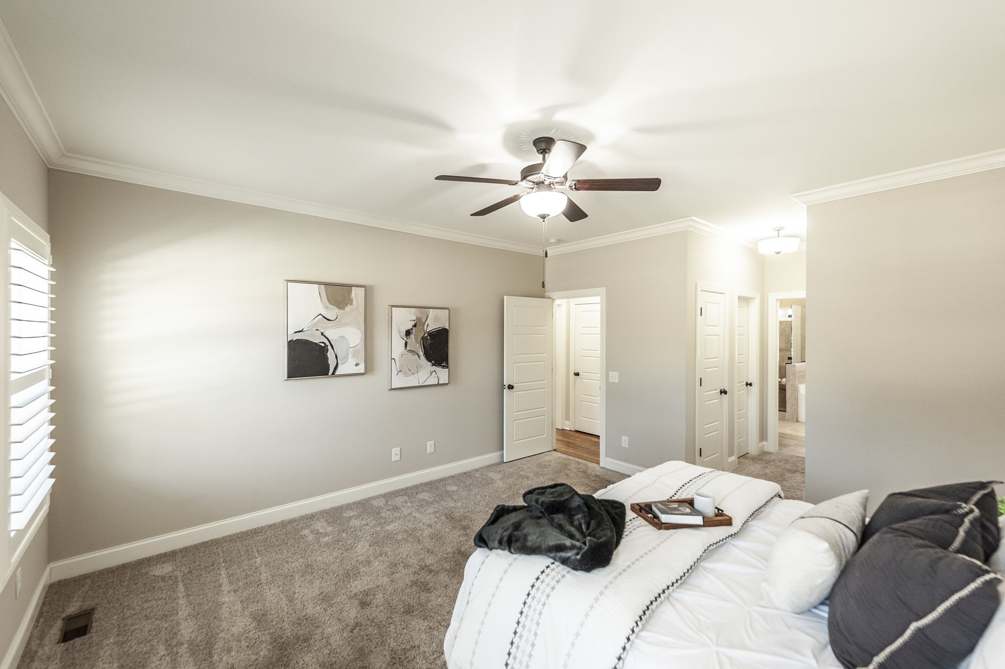 5563 Stacy Springs Road Springfield, TN 37172 - Photo 32 of 73 a bedroom with a bed and a chandelier