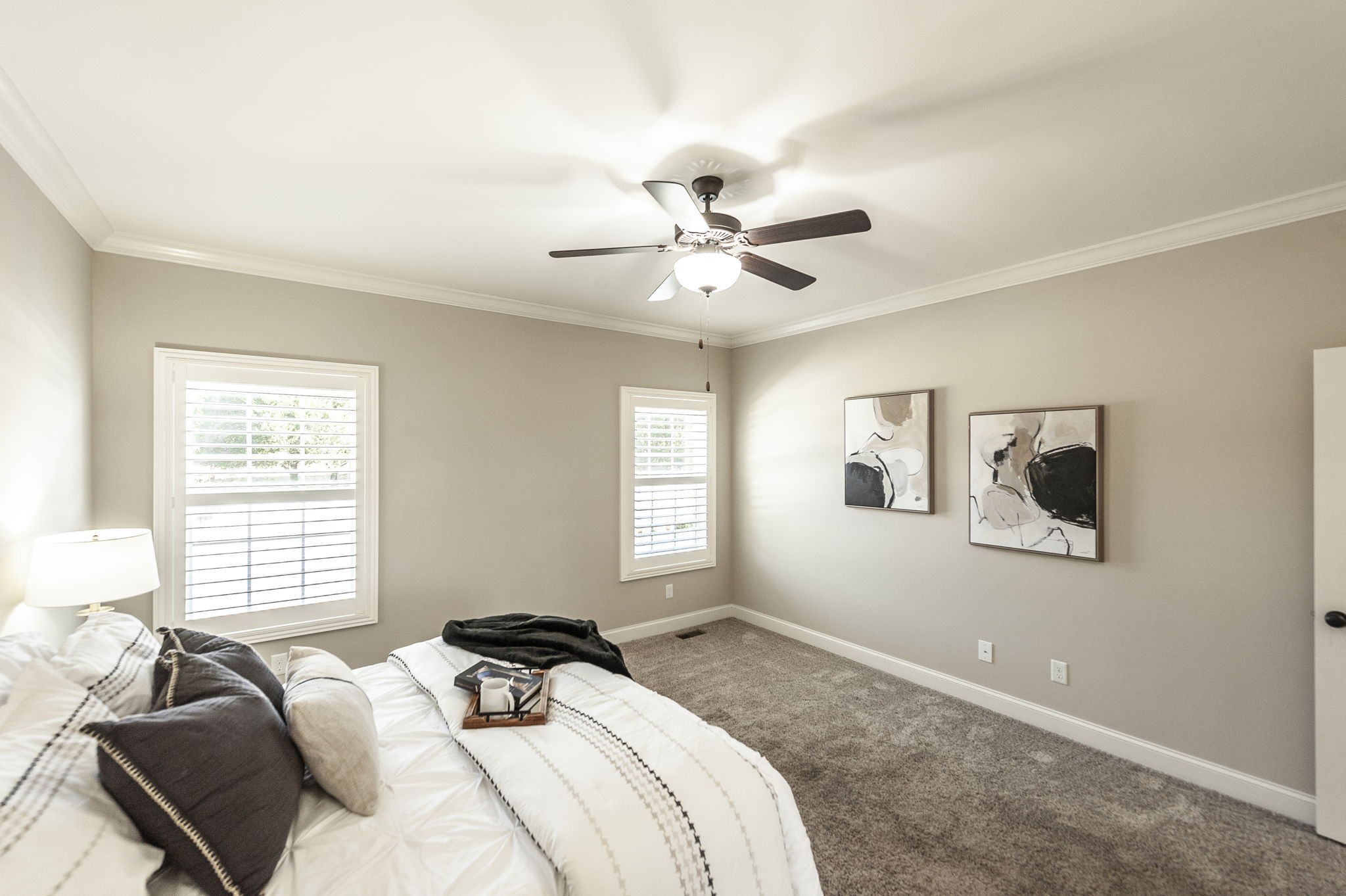 5563 Stacy Springs Road Springfield, TN 37172 - Photo 33 of 73 a bedroom with a bed and a chandelier