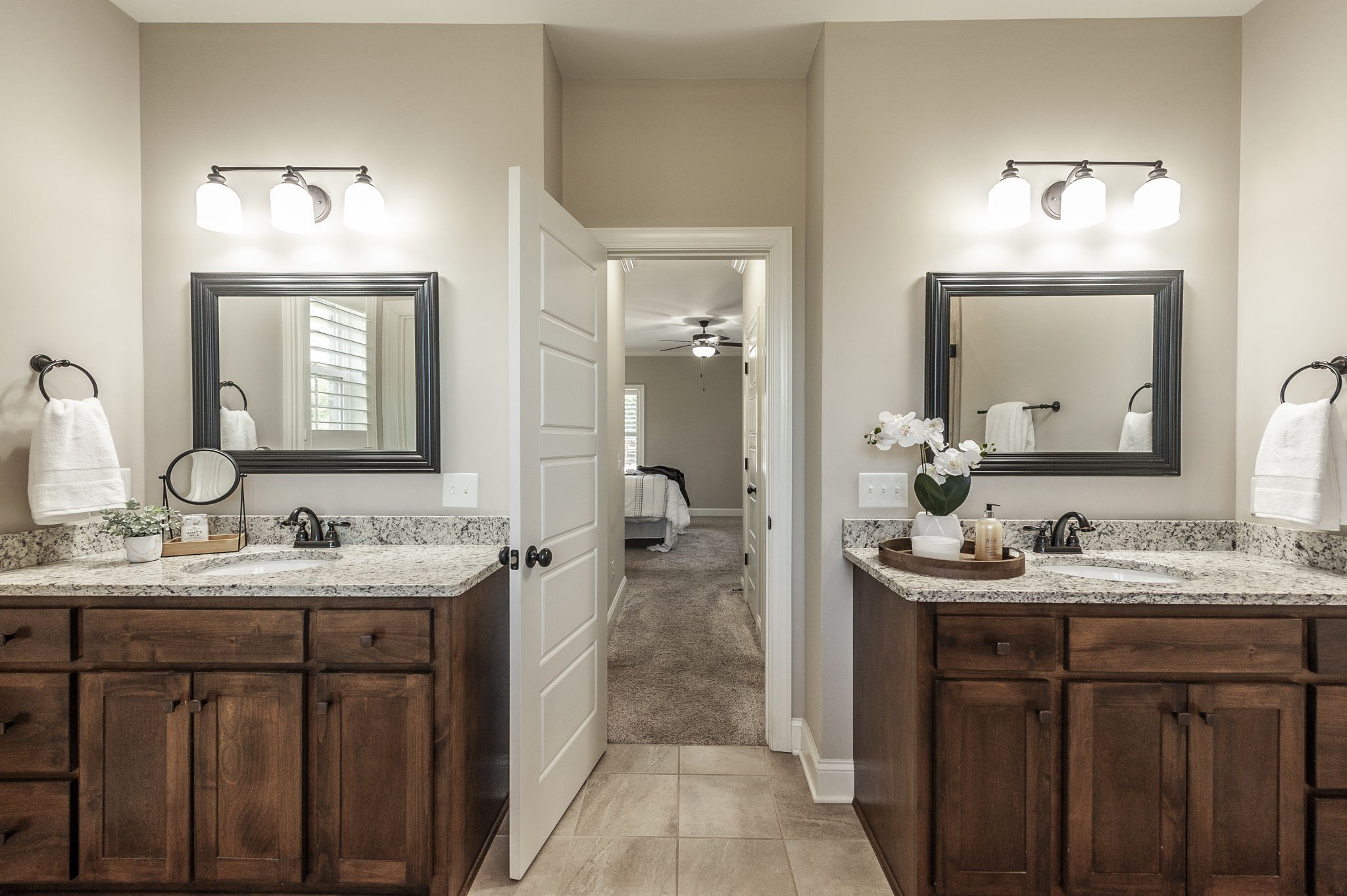 5563 Stacy Springs Road Springfield, TN 37172 - Photo 36 of 73 a bathroom with a double vanity sink and mirror