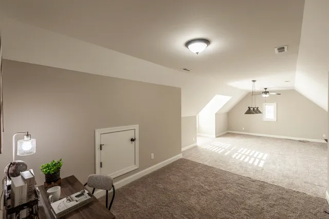 a view of a swimming pool with an outdoor seating