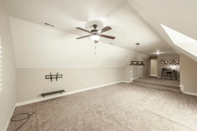 a view of house with yard