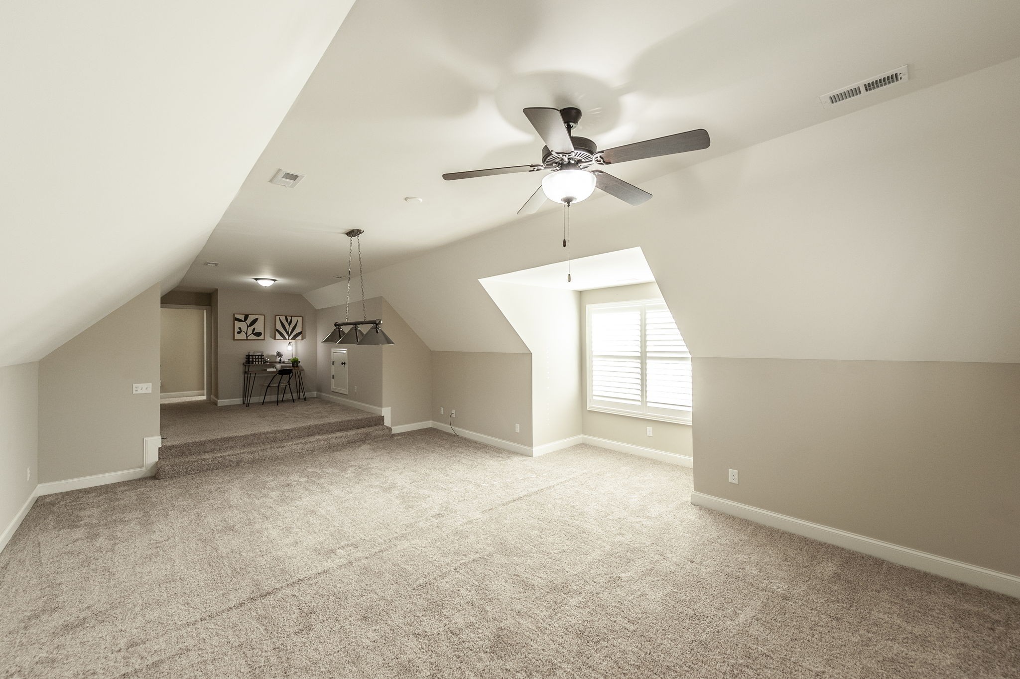 5563 Stacy Springs Road Springfield, TN 37172 - Photo 47 of 73 a view of a livingroom with a ceiling fan and window