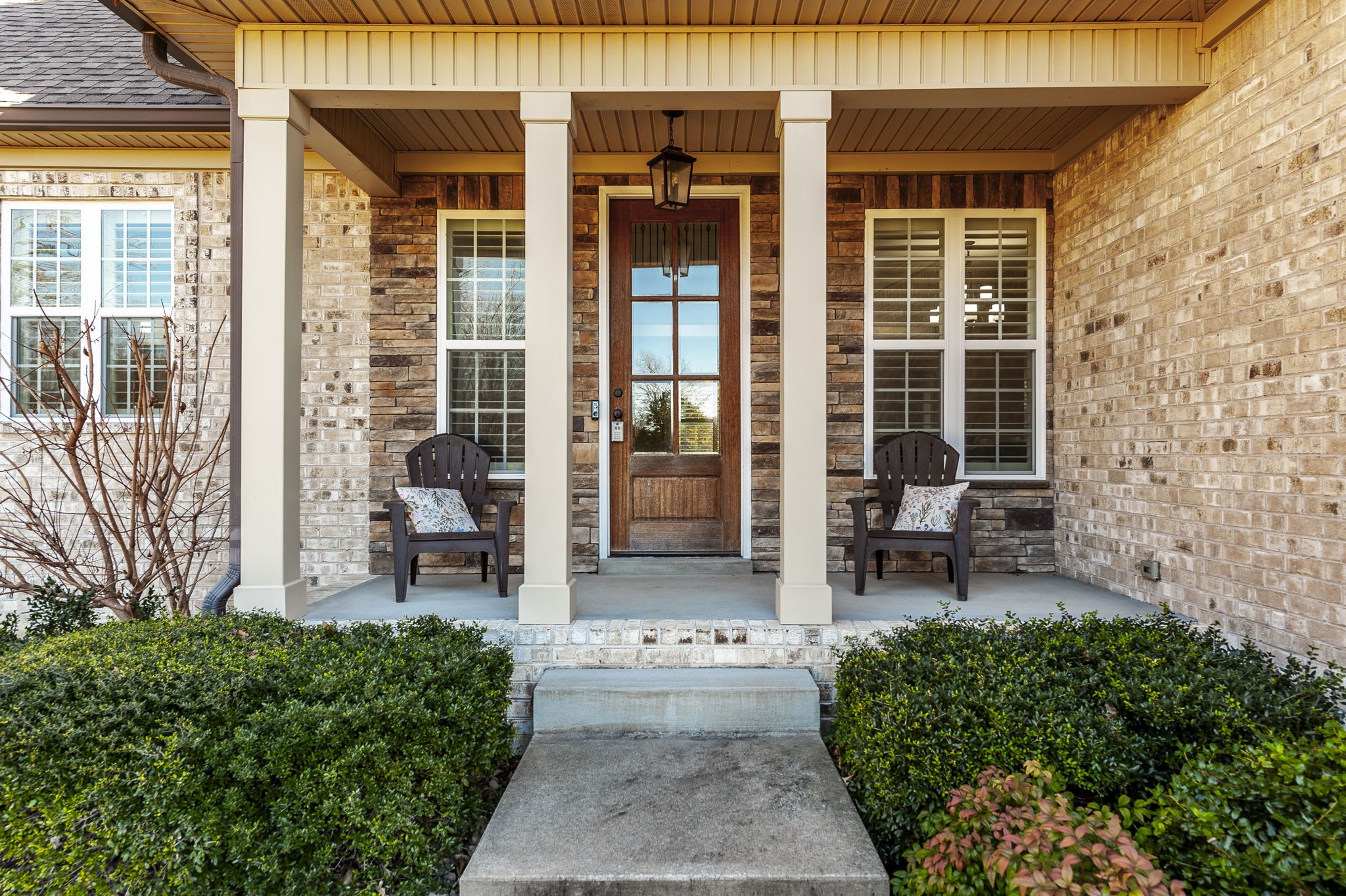 5563 Stacy Springs Road Springfield, TN 37172 - Photo 7 of 73 a front view of a house with outdoor seating and plants