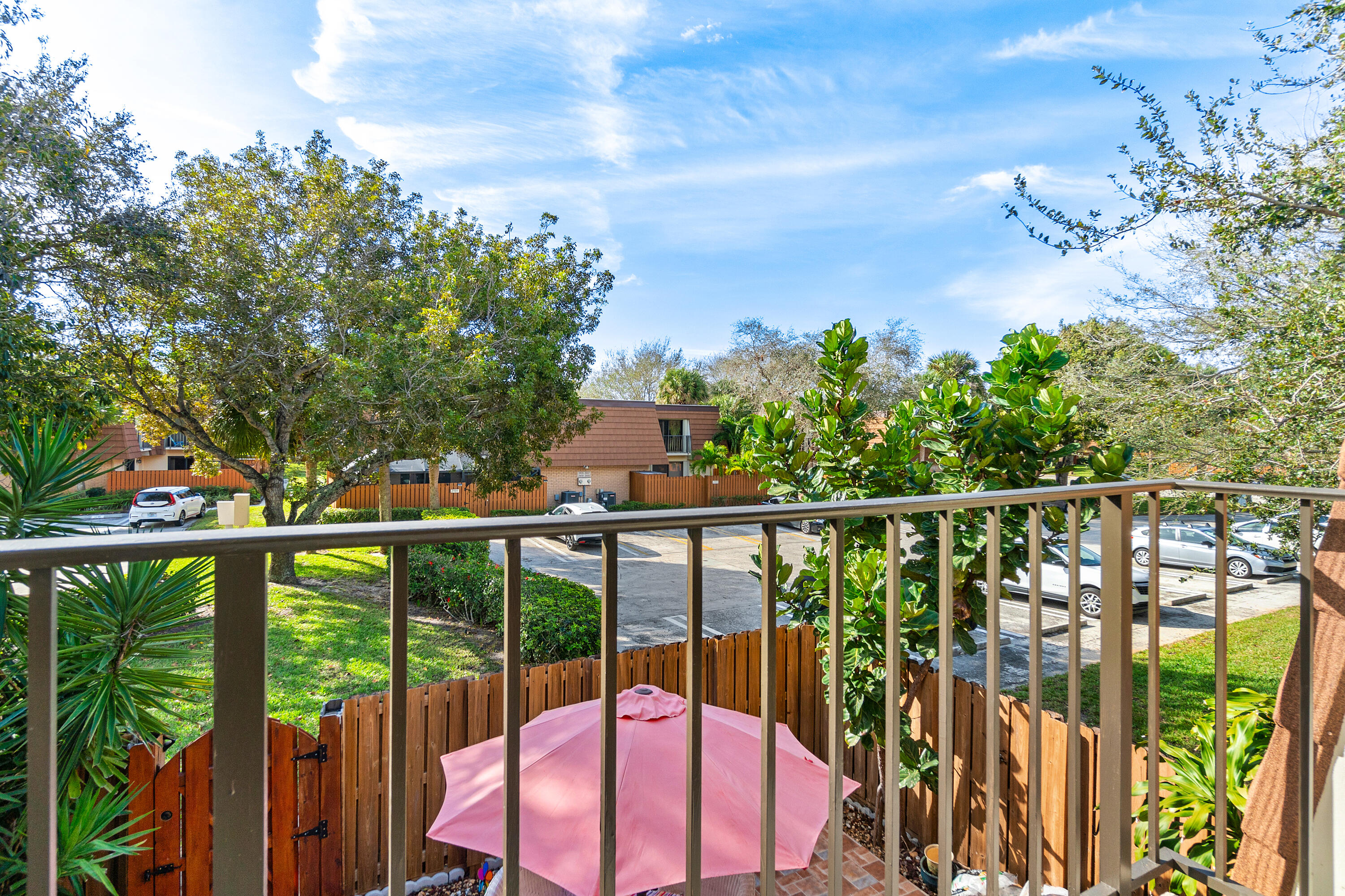 2906 29th Court Jupiter, FL 33477 - Photo 20 of 31 a view of a balcony with lake view