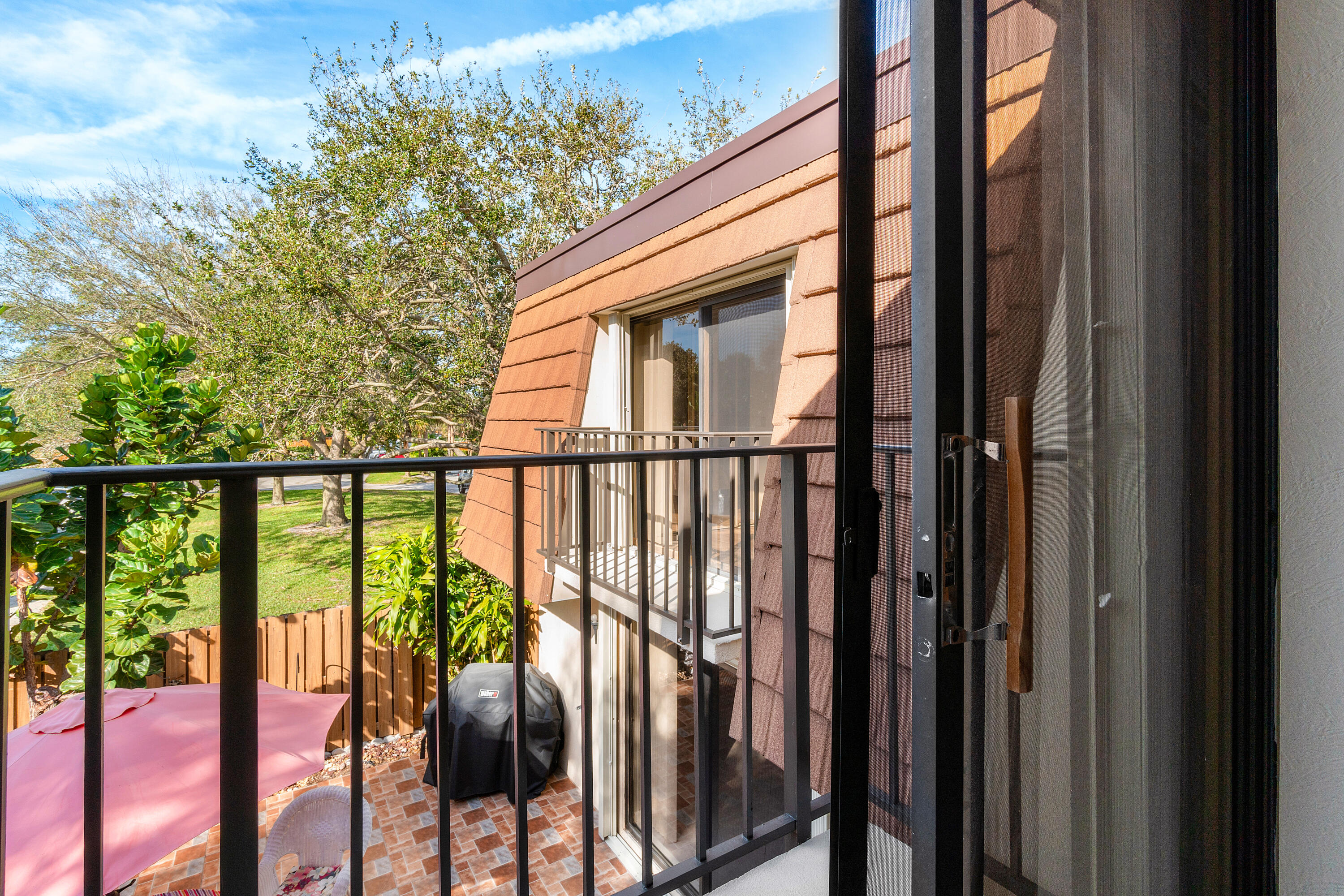 2906 29th Court Jupiter, FL 33477 - Photo 25 of 31 a view of balcony with furniture
