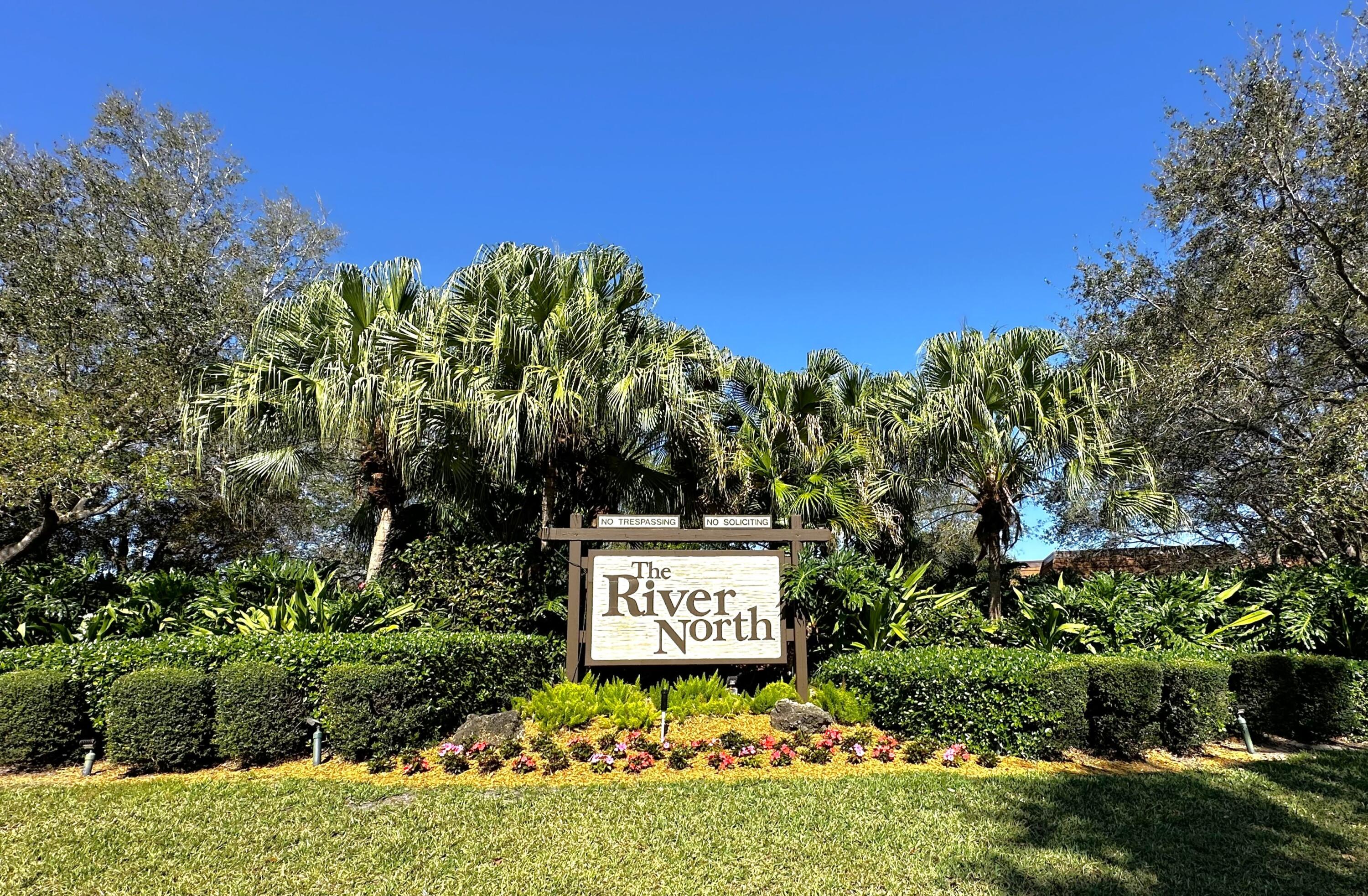 2906 29th Court Jupiter, FL 33477 - Photo 29 of 31 a sign on the side of the road