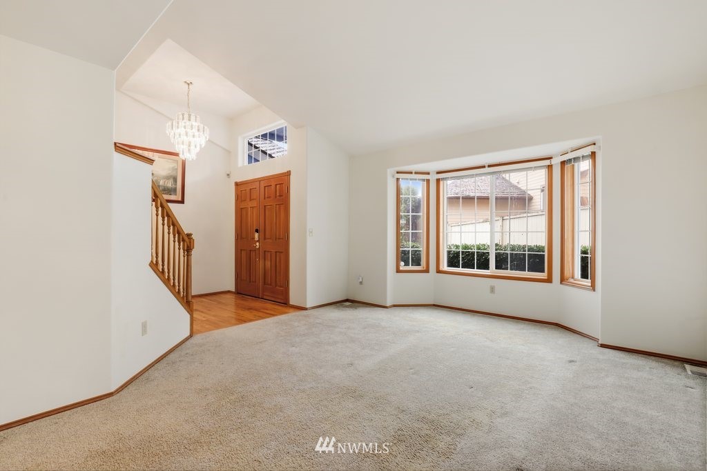 9641 South 194th Street Renton, WA 98055 - Photo 5 of 29 an empty room with windows and closet