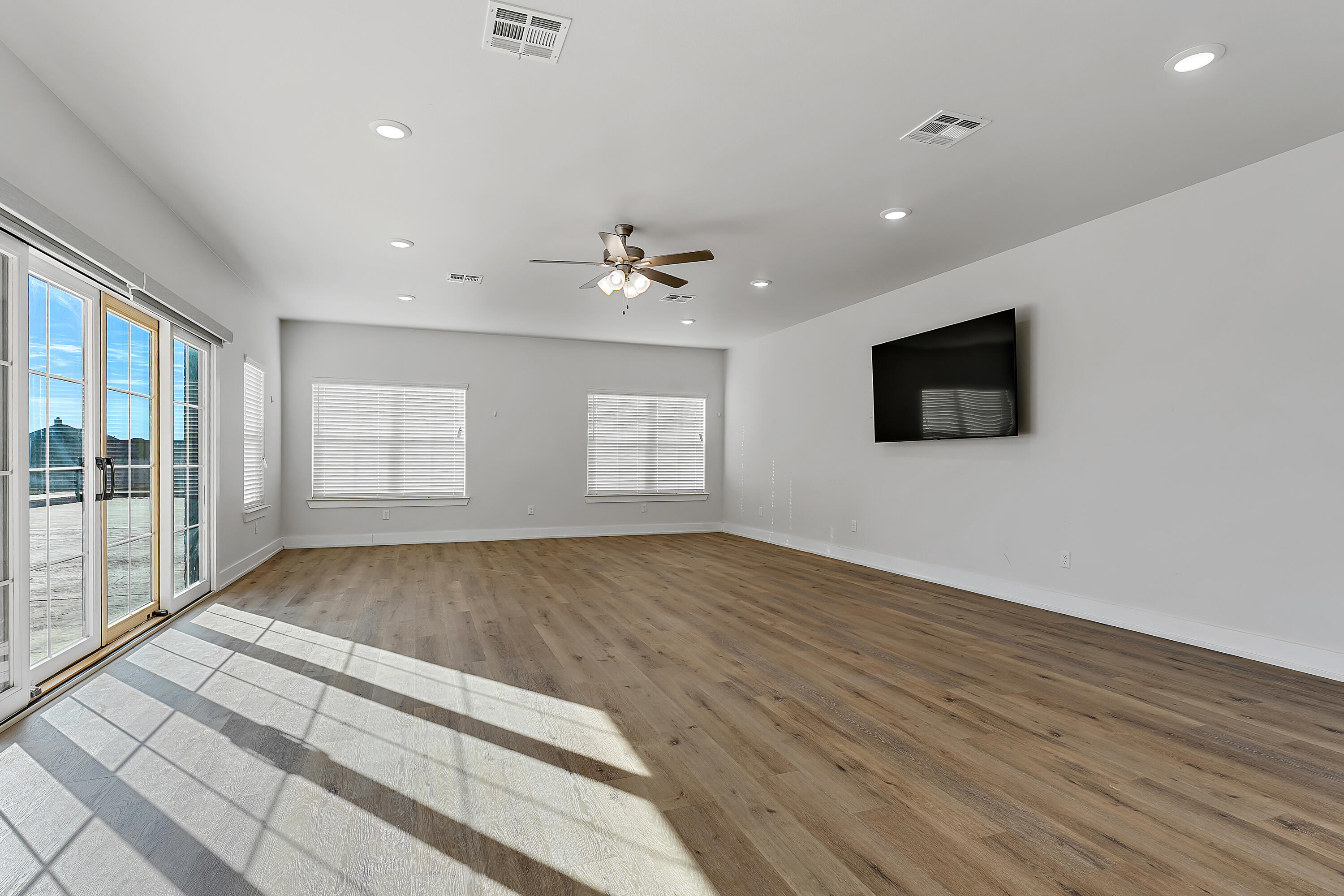 9217 County Road 6870 Lubbock, TX 79407 - Photo 31 of 39 a view of an empty room with a window and a kitchen