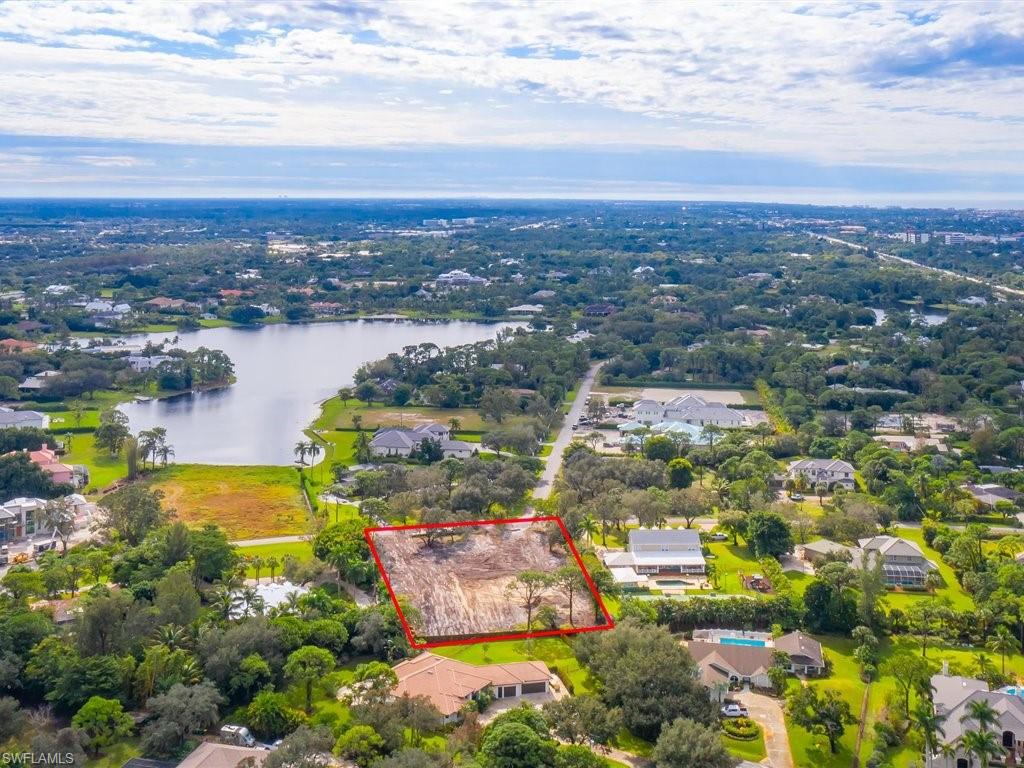 107 Myrtle Road Naples, FL 34108 - Photo 5 of 11 an aerial view of city and lake