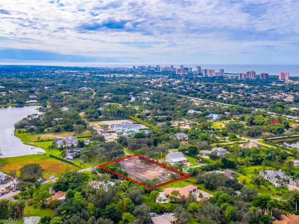 107 Myrtle Road Naples, FL 34108 - Photo 6 of 11 an aerial view of residential houses with outdoor space and trees