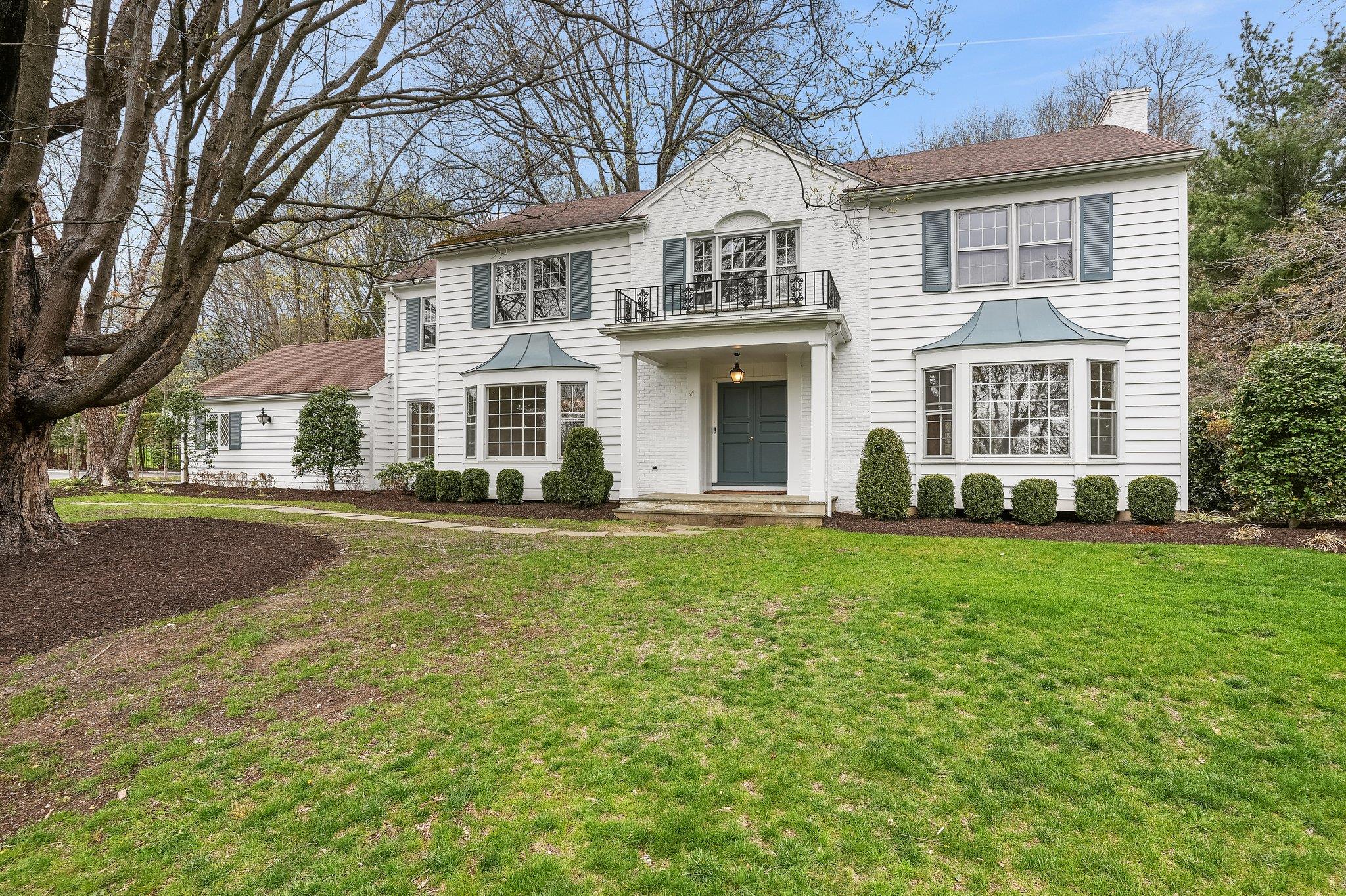 23 Round Hill Road Chappaqua, NY 10514 - Photo 1 of 1 a front view of a house with a yard