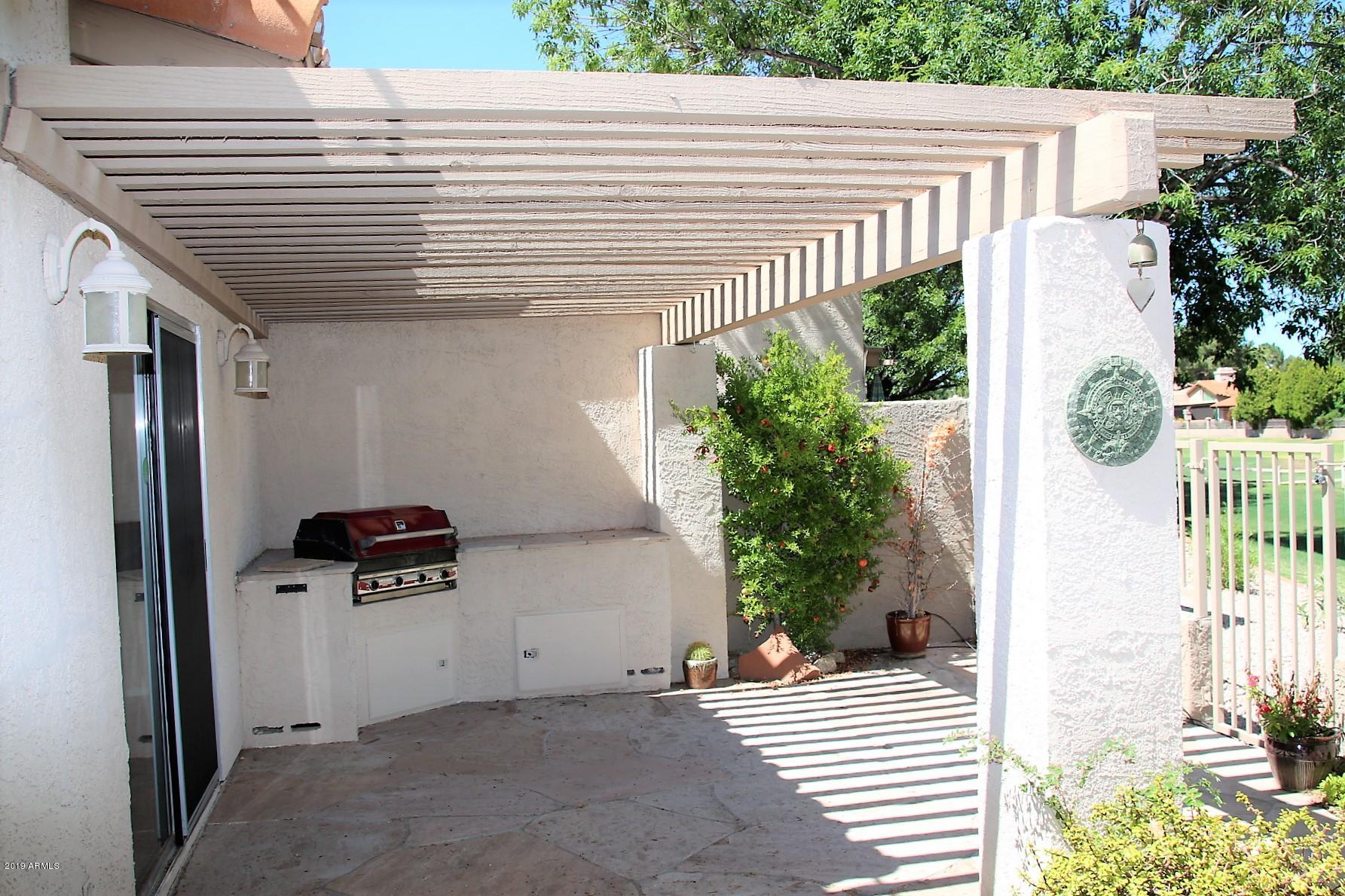 11615 North 40th Way Phoenix, AZ 85028 - Photo 13 of 33 Patio with Bar-b-que