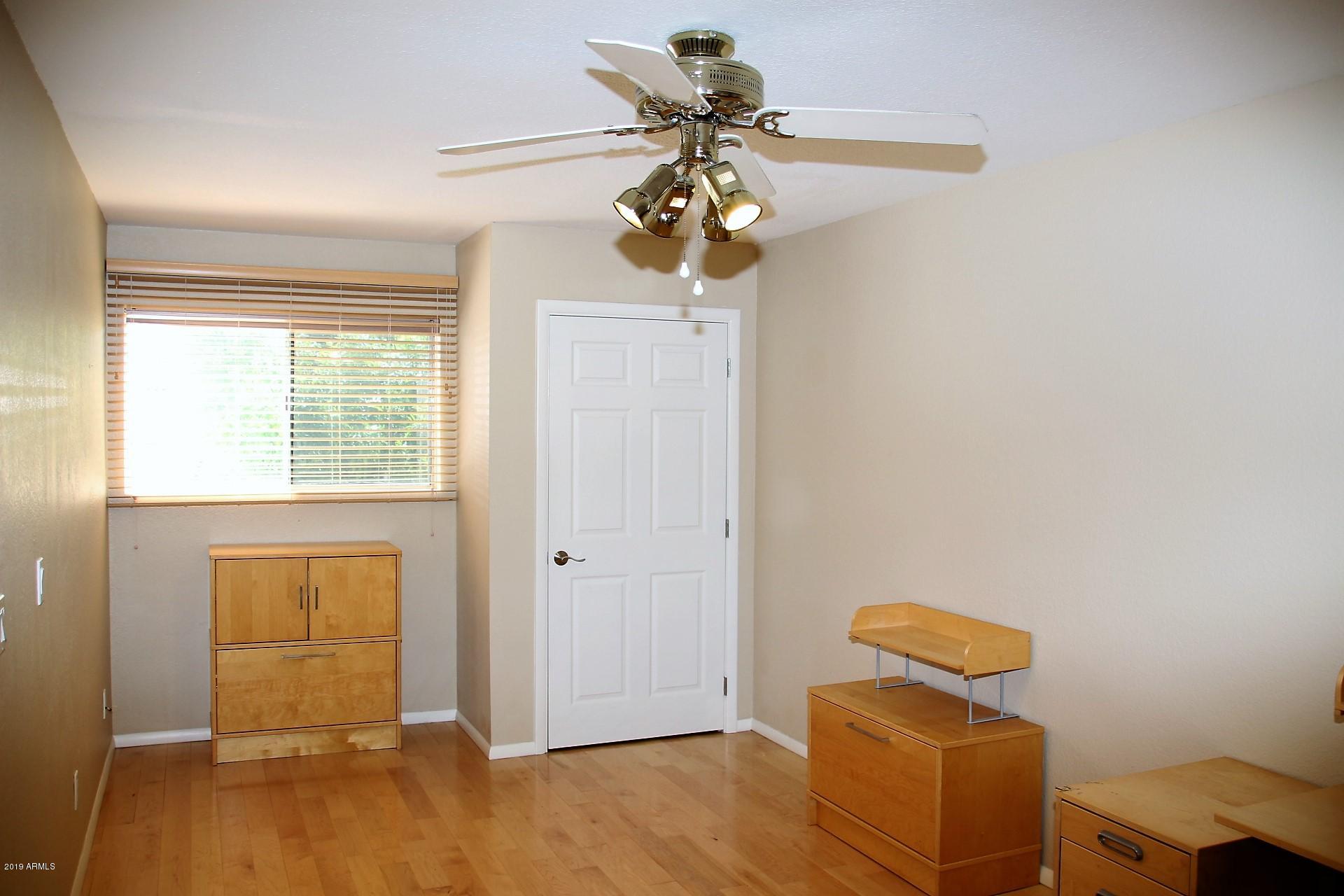 11615 North 40th Way Phoenix, AZ 85028 - Photo 16 of 33 a view of entryway with wooden floor