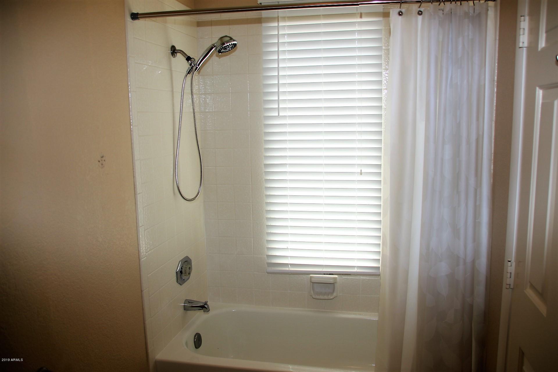 11615 North 40th Way Phoenix, AZ 85028 - Photo 20 of 33 a bathroom with a shower