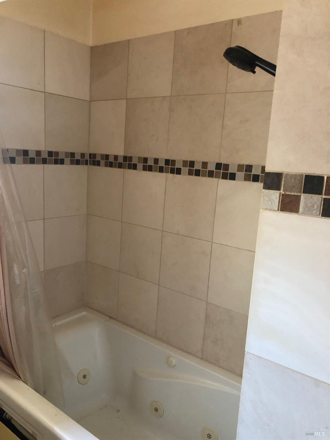 306 Marin Avenue Mill Valley, CA 94941 - Photo 14 of 26 a bathroom with a bathtub